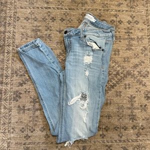 “Oasis” ripped skinny jeans